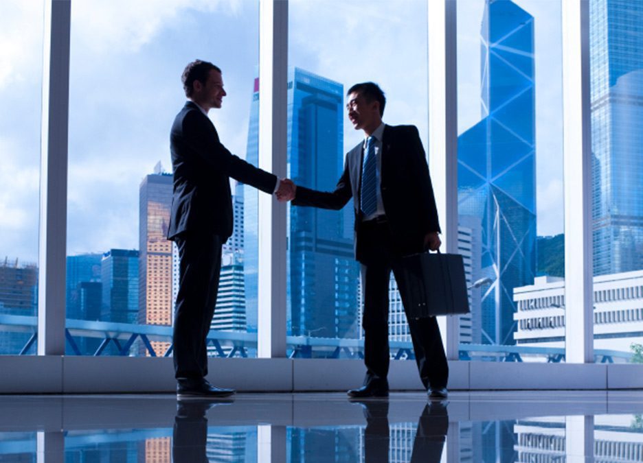 Two businessmen shaking hands